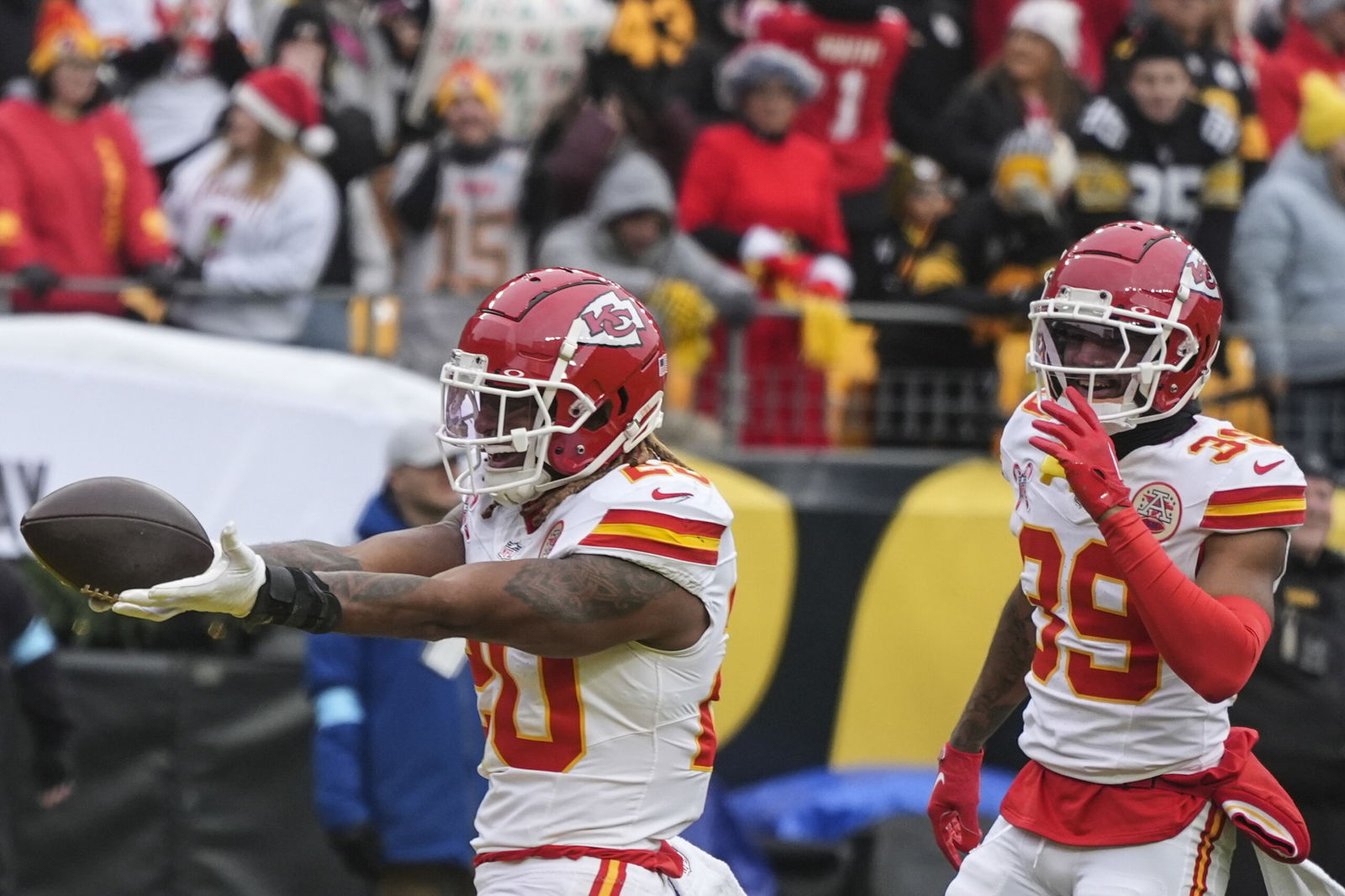 Kansas City Chiefs safety Justin Reid celebrates his interception off Pittsburgh Steelers quarterback Russell Wilson during the first half Wednesday in Pittsburgh.