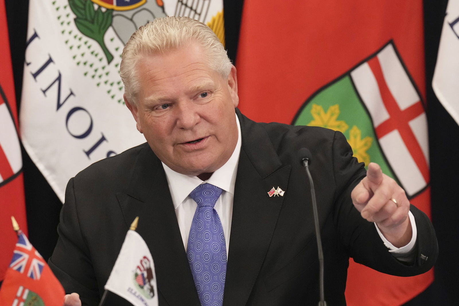 Ontario Premier Doug Ford attends a signing of a memorandum of understanding with Governor of Illinois J.B. Pritzker on June 11 at the US-Canada Summit in Toronto
