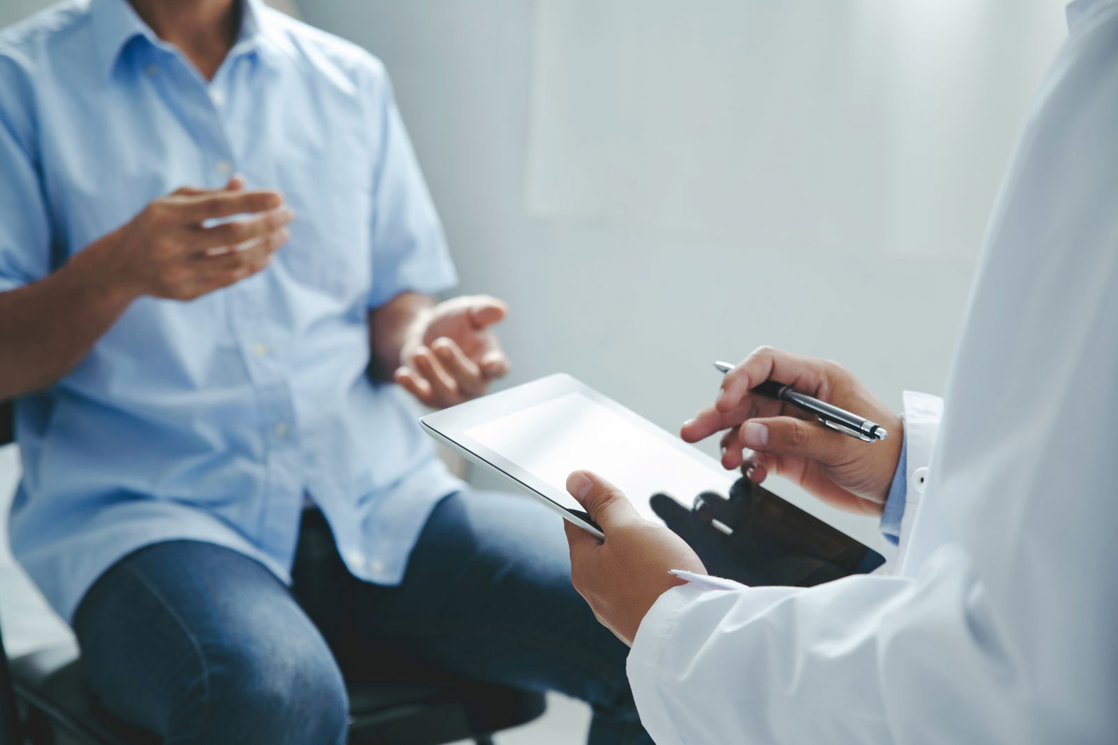 A patient talks to his doctor.