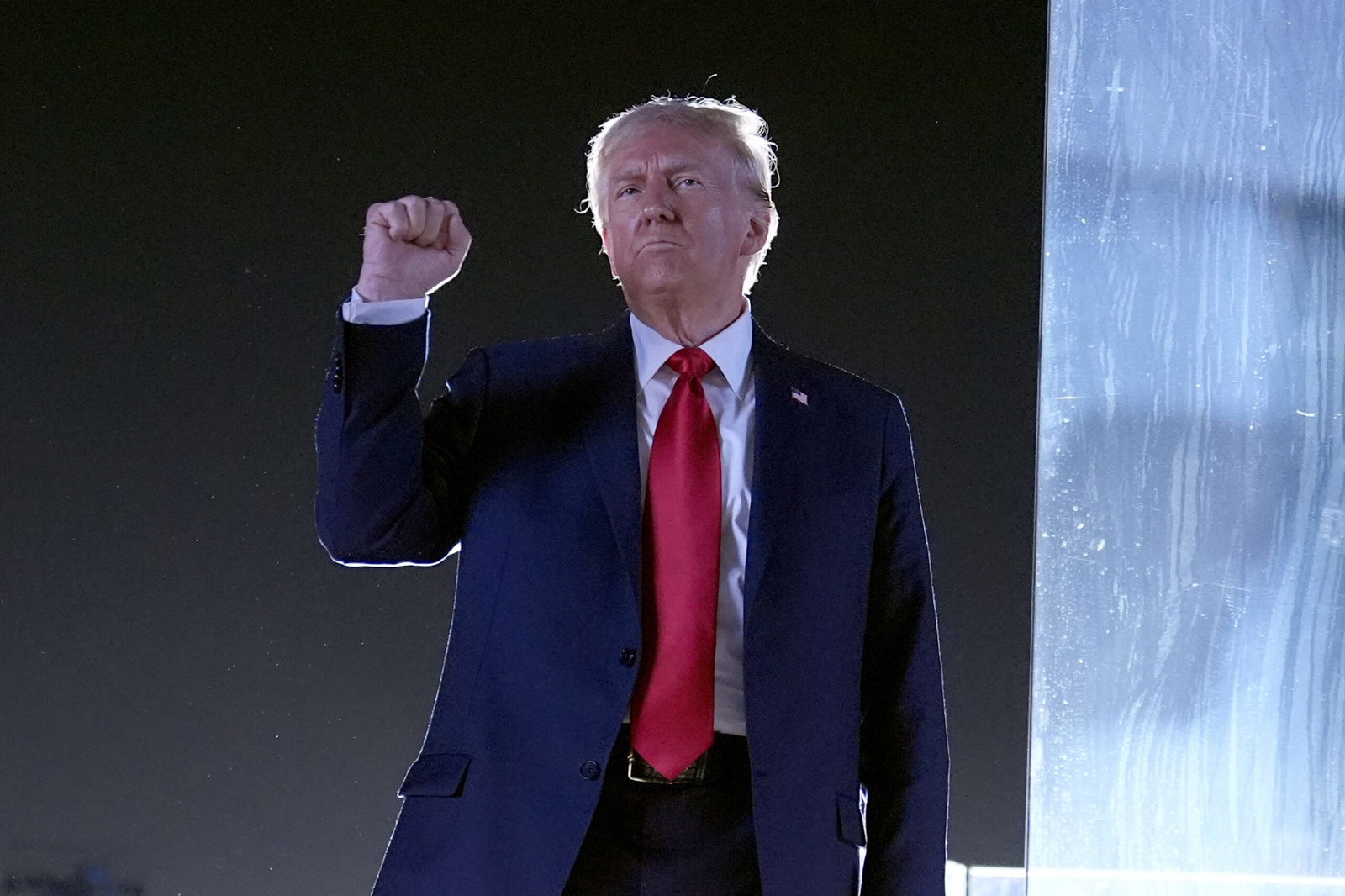 Republican presidential nominee former President Donald Trump gestures as he concludes speaking at a campaign event on Oct. 5 at the Butler Farm Show in Butler