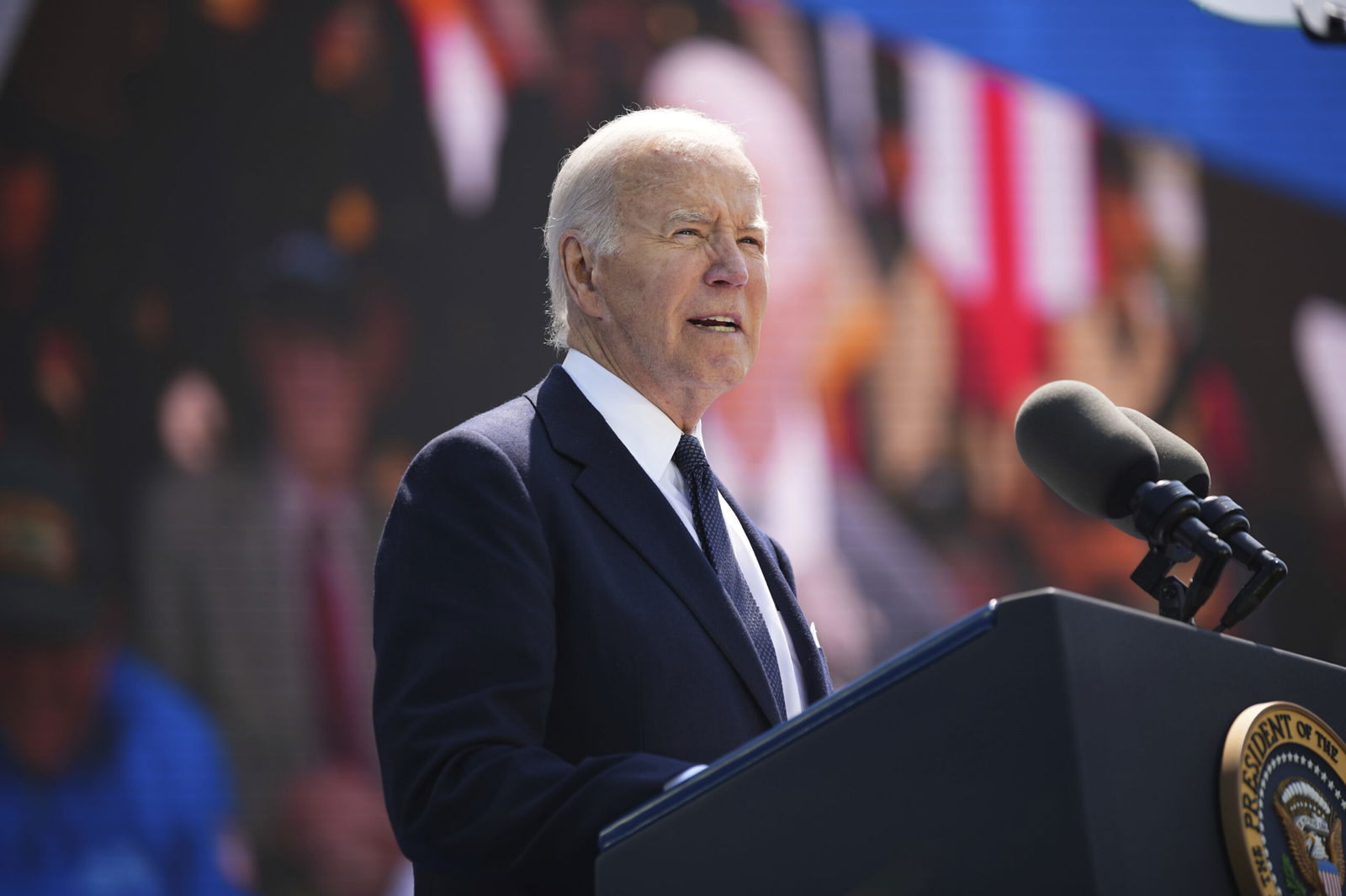 President Joe Biden delivers a speech during a commemorative ceremony to mark the D-Day 80th anniversary on Thursday at the U.S. cemetery in Colleville-sur-Mer