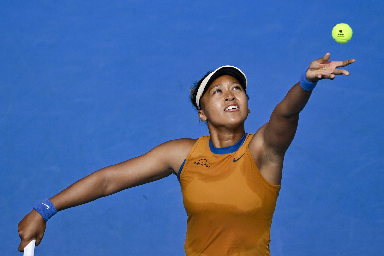 Namoi Osaka of Japan serves against Lina Glushko of Israel during a women's singles match at the ASB Classic tennis tournament at Manuka Doctor Arena in Auckland