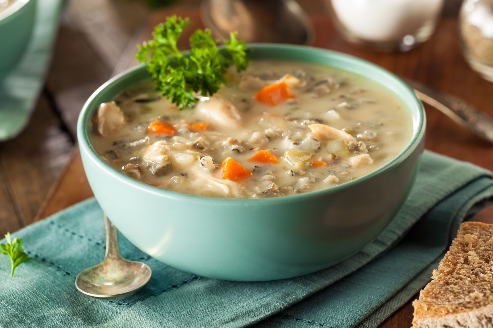 Homemade wild rice and chicken soup in a bowl.