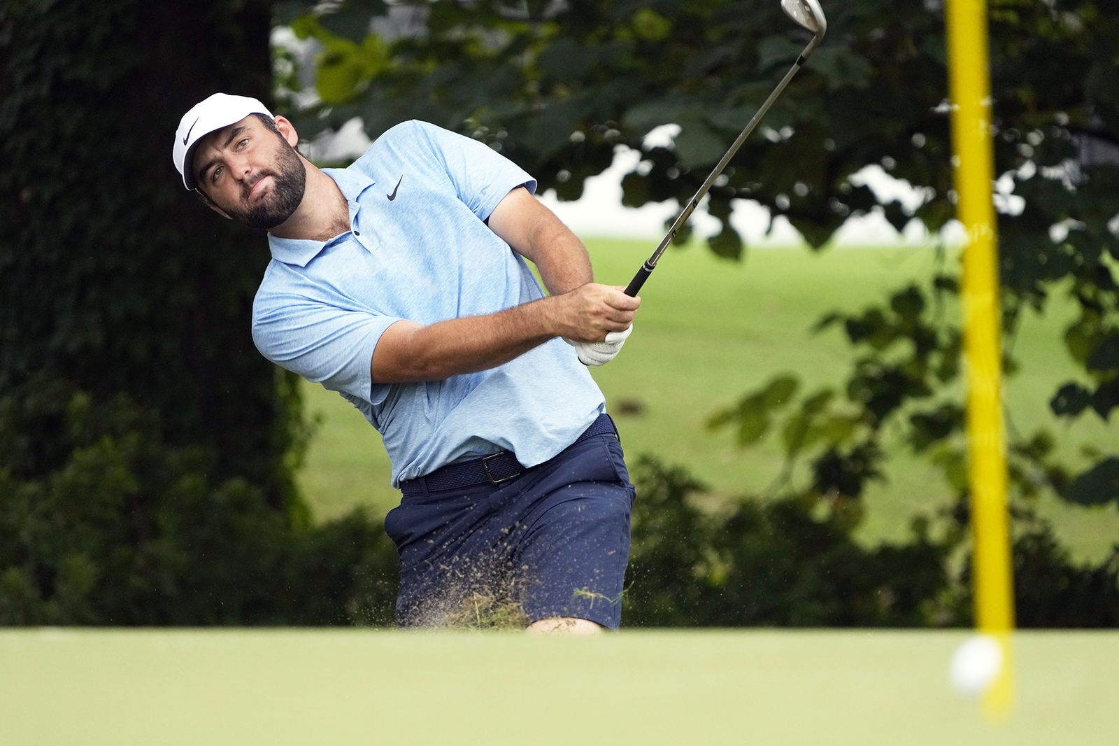 Scottie Scheffler hits onto a practice green Wednesday at the St. Jude Championship in Memphis