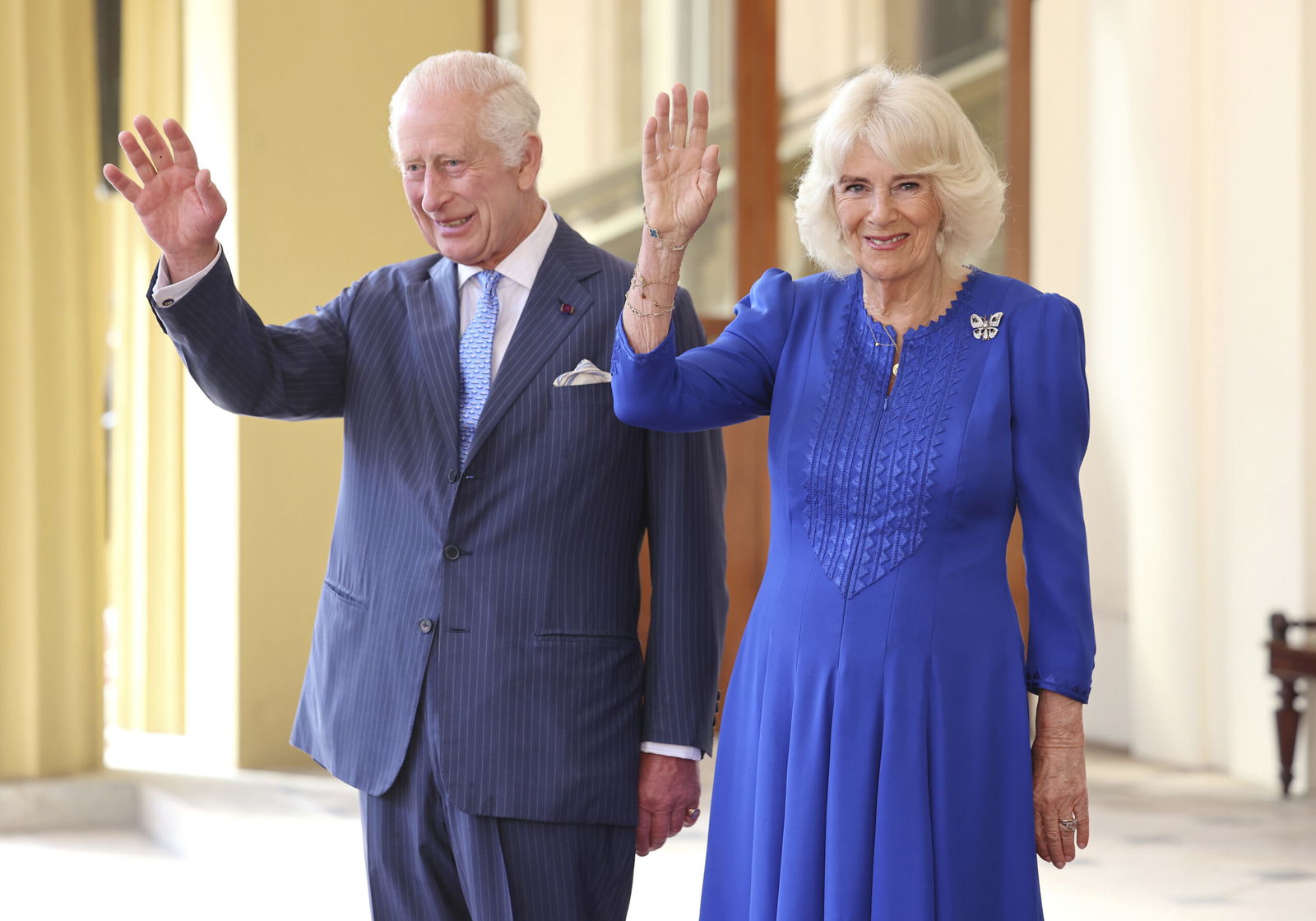 Britain’s King Charles III and Queen Camilla wave as they formally bid farewell to Japan’s Emperor Naruhito and Empress Masako on the final day of their state visit to Britain at Buckingham Palace on June 27 in London. King Charles III is preparing to visit Australia and Samoa in October 2024