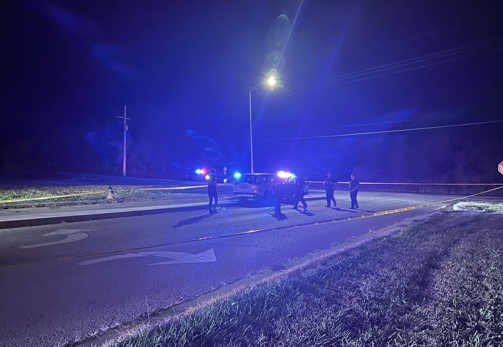 Police work the scene at South 40th Street and Commonwealth Drive on Wednesday