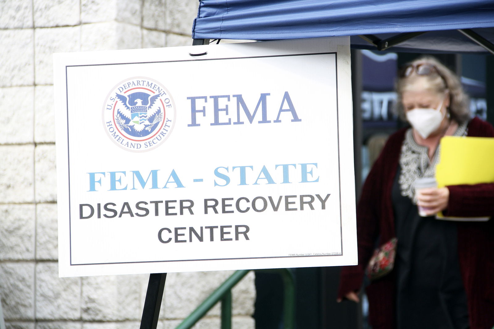 People gather at a FEMA Disaster Recovery Center on Tuesday at A.C. Reynolds High School in Asheville