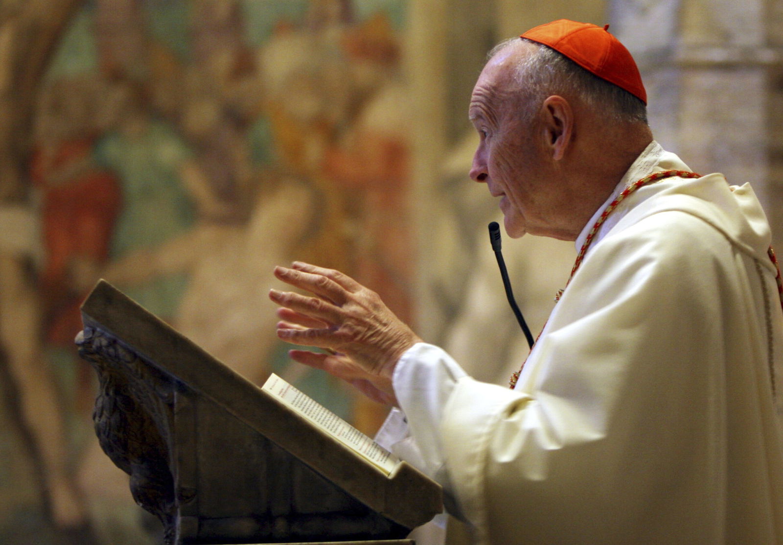 FILE - Washington Cardinal Theodore McCarrick celebrates a mass inside St. Nereus and Achilleus Church in Rome