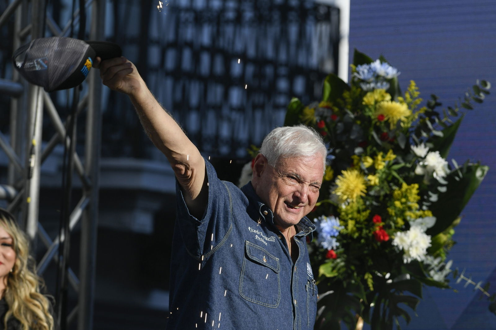 FILE - Panama's former President Ricardo Martinelli waves to supporters during a campaign rally