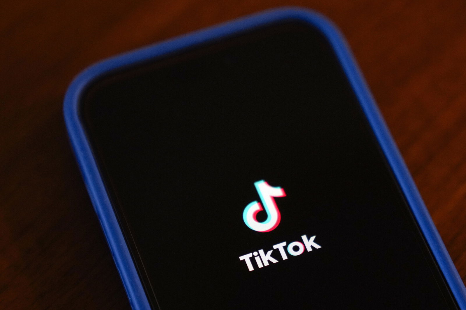 FILE - The TikTok app logo is shown on an iPhone on Friday