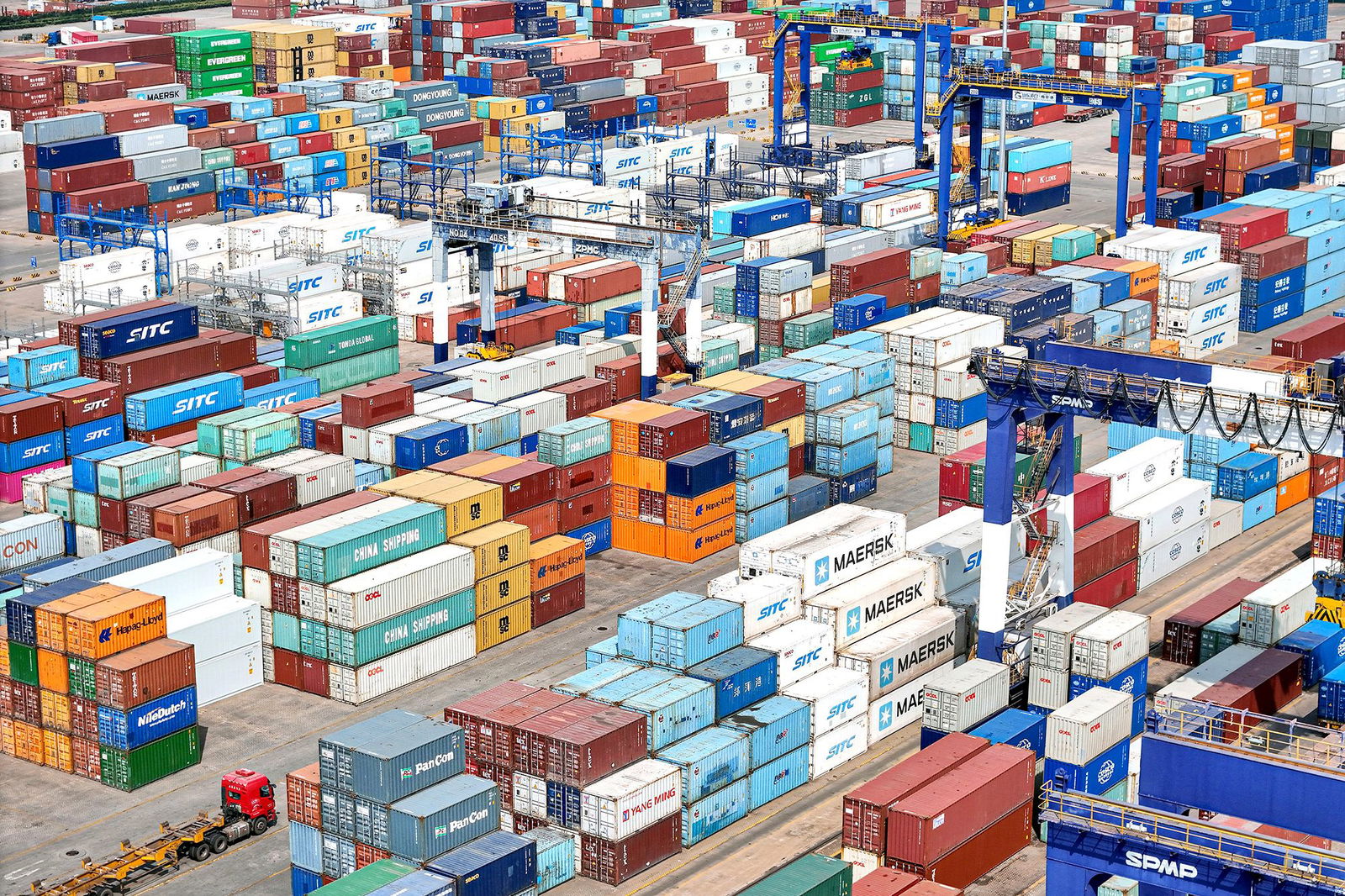 <i>AFP/Getty Images via CNN Newsource</i><br/>Shipping containers are stacked at a port in Yantai
