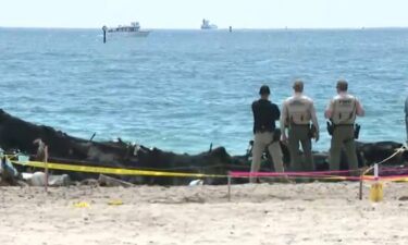An investigation is underway after a man was hospitalized and crews battled a boat that was found engulfed in flames.