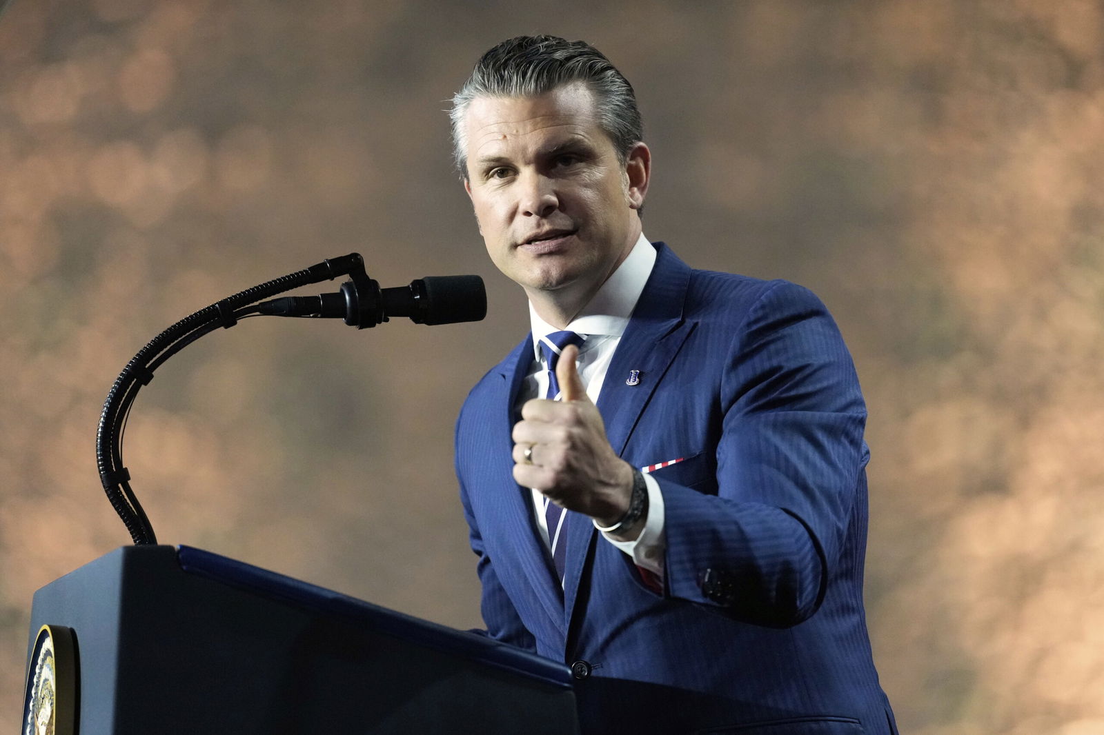 U.S. Secretary of Defense Pete Hegseth speaks at the Al Udeid Air Base