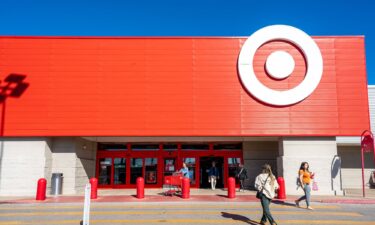 Customers enter and exit a Target store in November 2024 in Austin