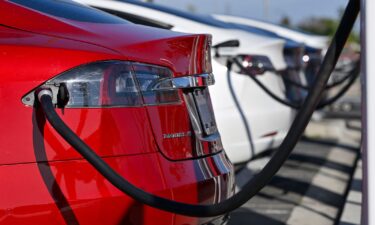 Drivers charge their Teslas in Fountain Valley