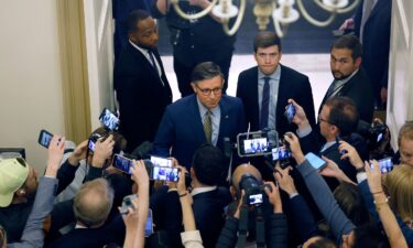 Speaker of the House Mike Johnson speaks to reporters as he departs for the White House as ongoing negotiations between House leadership