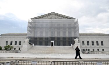 A police officer is seen outside the Supreme Court of the United States is seen on Thursday May 15