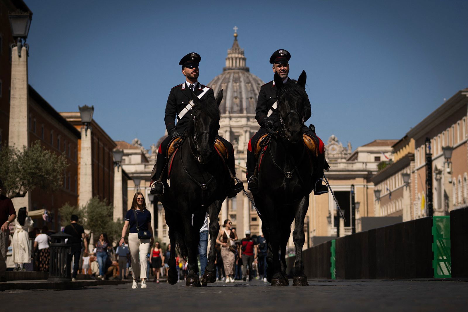 <i>Tiziana Fabi/AFP/Getty Images via CNN Newsource</i><br/>Italy's Carabinieri patrol near St Peter's square in The Vatican on May 1. All mobile phone signals will be deactivated in the Vatican on Wednesday ahead of the highly secretive conclave to elect the next pope.