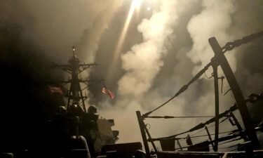 A ship fires missiles at an undisclosed location  after President Donald Trump launched military strikes against Yemen's Iran-aligned Houthis in this screengrab obtained from a handout video released on March 15.