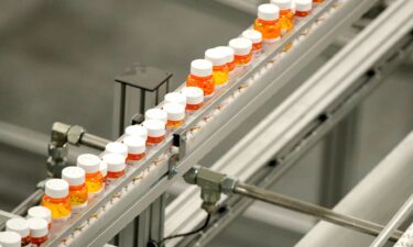 This 2018 photo shows bottles of medicine at a mail-in pharmacy warehouse in Florence