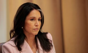 Director of National Intelligence Tulsi Gabbard listens during a Cabinet meeting at the White House on April 10 in Washington
