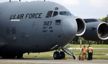 A US Air force flight carrying deported migrants by the US government arrives at Ramon Villeda Morales International Airport on January 31 in San Pedro Sula