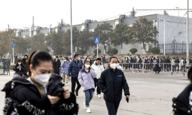 Employees during lunch hours at a Foxconn Technology Group plant in Zhengzhou