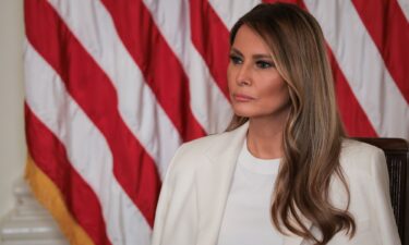 US first lady Melania Trump looks on during the unveiling of a Postal Service stamp honoring former first lady Barbara Bush in the East Room at the White House.