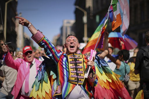 A participant in the Pride march cheers in Budapest