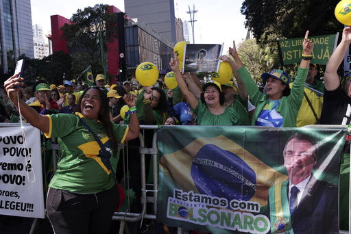 Supporters of former President Jair Bolsonaro protest his Supreme Court trial