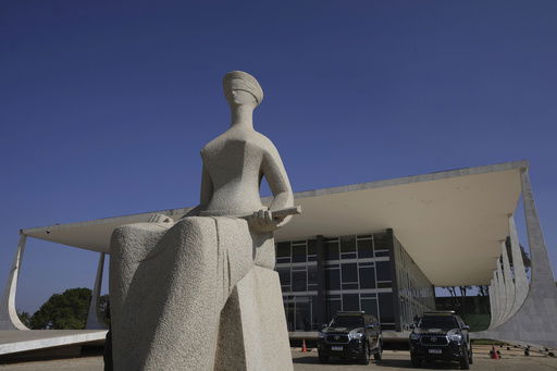 FILE - Lady Justice statue