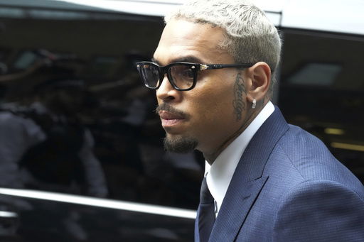 R&B singer Chris Brown arrives at Southwark Crown Court to attend a plea hearing in London
