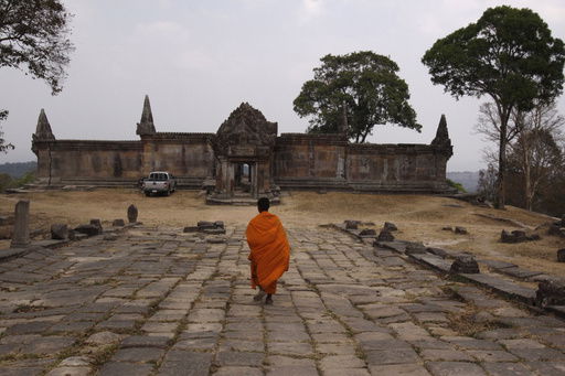 FILE- A Cambodian Buddhist monk walks toward the Cambodia's 11th century Hindu Preah Vihear temple
