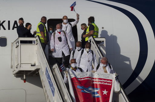 FILE - Cuban doctors arrive at the Jose Marti International Airport in Havana