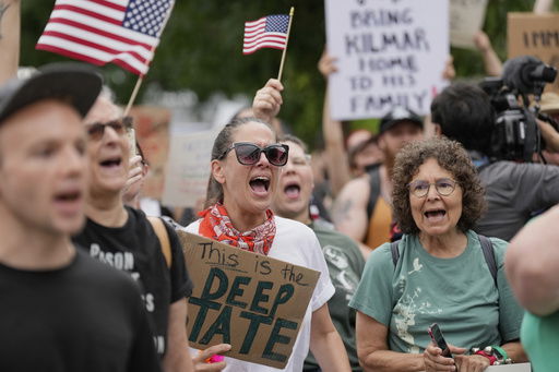 Protesters gather outside the Federal Courthouse before arguments whether Kilmar Abrego Garcia can be released from jail on Friday