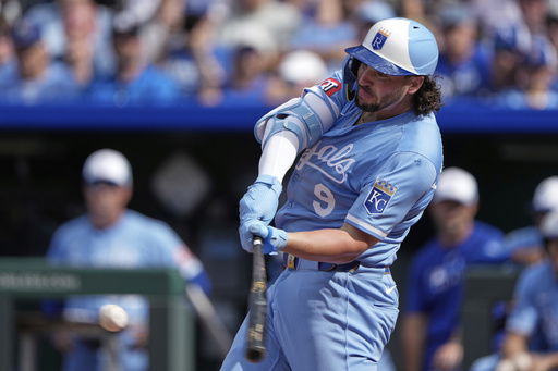 Kansas City Royals' Vinnie Pasquantino hits a two-run double during the seventh inning of a baseball game against the Los Angeles Dodgers Saturday