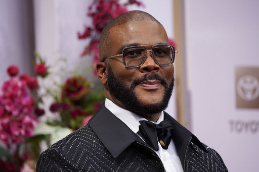FILE - Tyler Perry arrives at the BET Awards on Monday