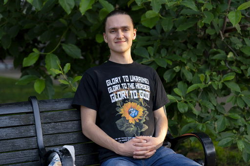 Vladyslav Plyaka poses for a photo at Capitol Hill neighborhood in Washington