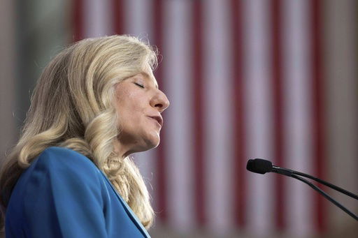 Democratic gubernatorial candidate Abigail Spanberger addresses a crowd at a rally at her alma mater