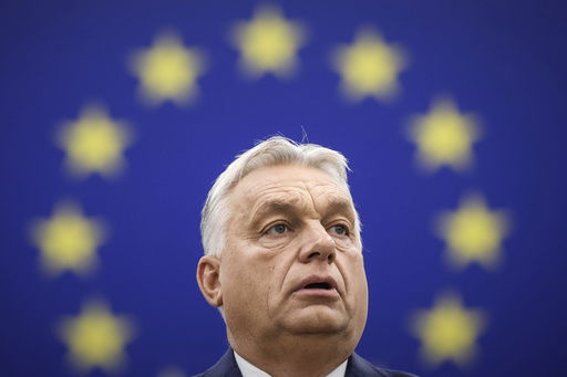 FILE - Hungarian Prime Minister Viktor Orban delivers his speech in the hemicycle of the European parliament in Strasbourg