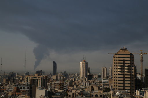 Huge smoke rises up from an oil facility facility after it appeared to have been hit by an Israeli strike Saturday