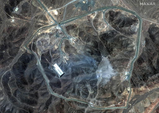 This satellite image provided by Maxar Technologies shows damage at the Fordo enrichment facility in Iran after U.S. strikes