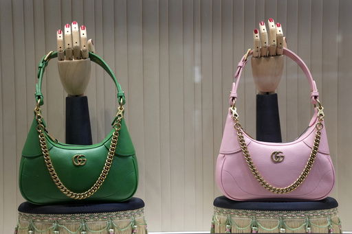 FILE - These are Gucci bags in the window of a Gucci store in Pittsburgh on Jan. 30