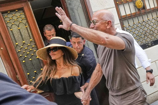 Lauren Sanchez Bezos and Jeff Bezos leave the Harry's Bar in Venice
