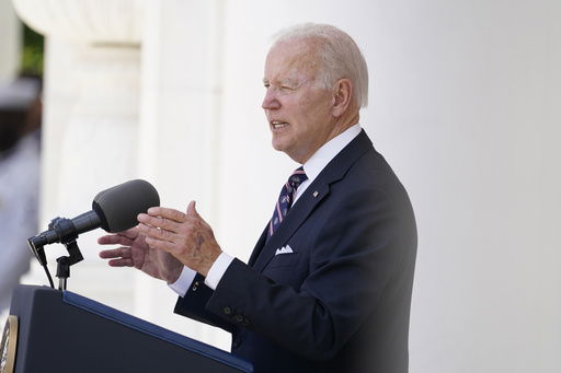 FILE - President Joe Biden speaks at the Memorial Amphitheater after laying a wreath at The Tomb of the Unknown Soldier at Arlington National Cemetery on Memorial Day