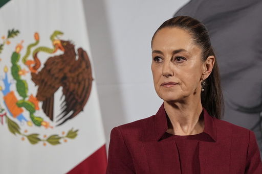 FILE - Mexican President Claudia Sheinbaum attends her morning press conference at the National Palace in Mexico City