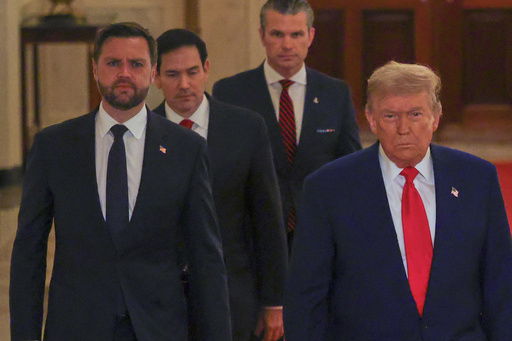 President Donald Trump arrives with Vice President JD Vance