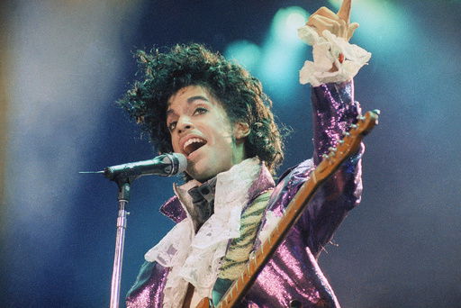 FILE - Prince performs at the Forum in Inglewood
