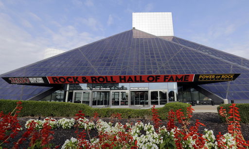 FILE - Signage marks the exterior of the Rock and Roll Hall of Fame