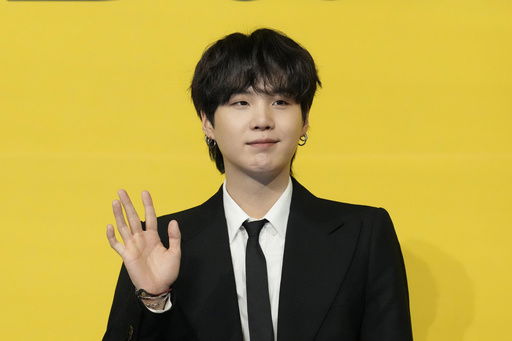 FILE - Suga